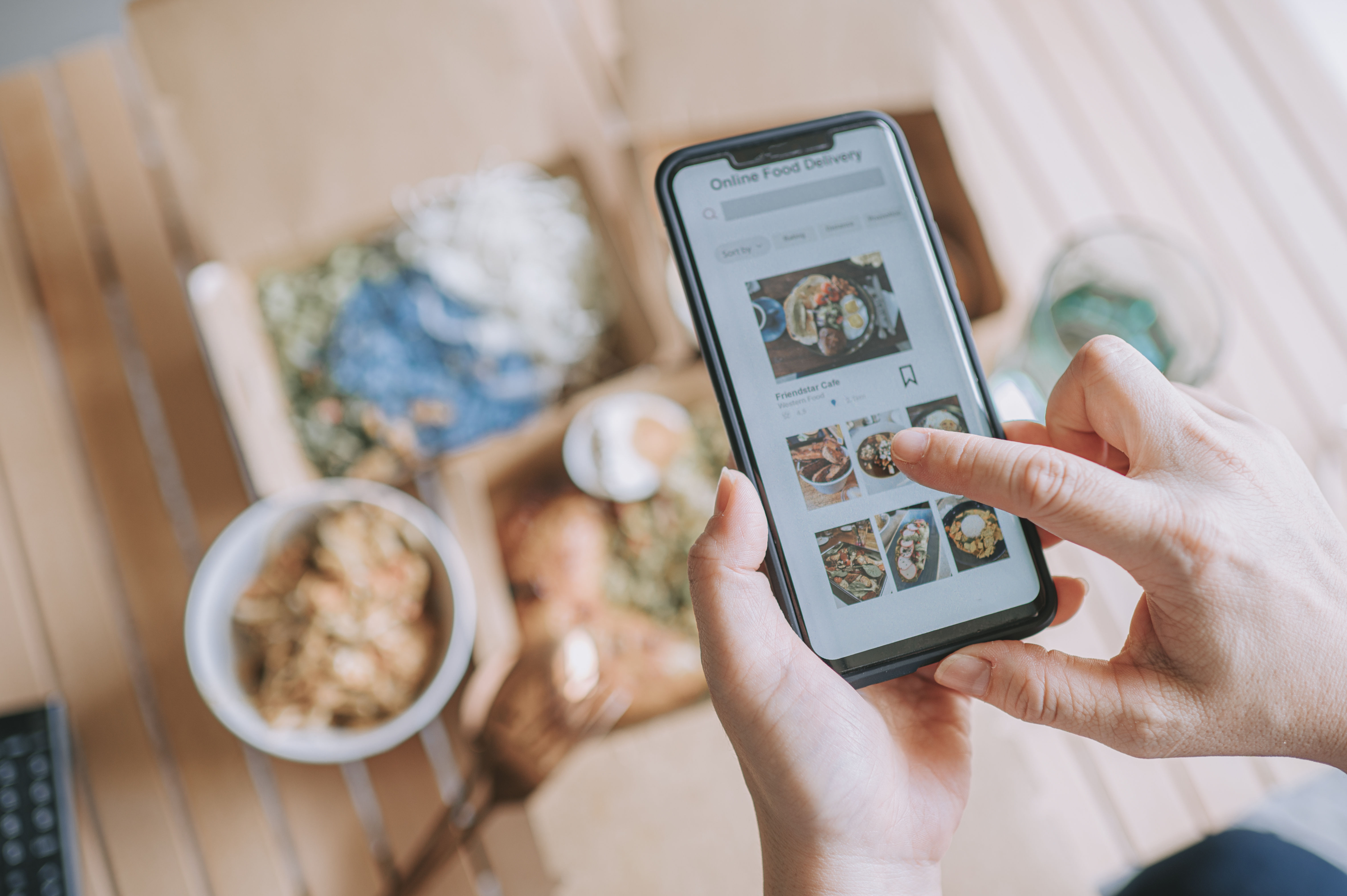 high angle view Close up Asian woman using meal delivery